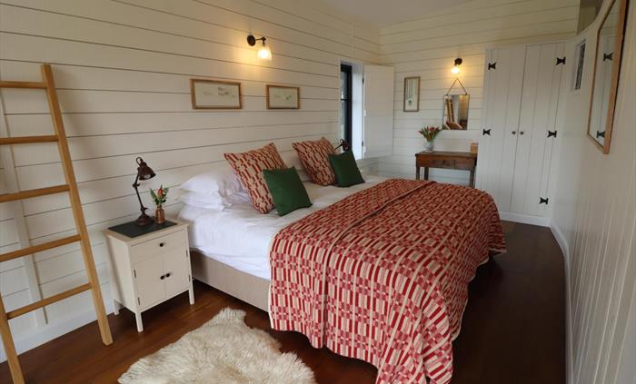 The Pavilion is a truly luxurious stay with its 5-meter window which allows unobstructed impressive views onto the Jurassic coastline whilst lying in